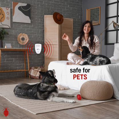 woman playing with dogs on the bed and an ultrasonic bedbug repeller on the wall